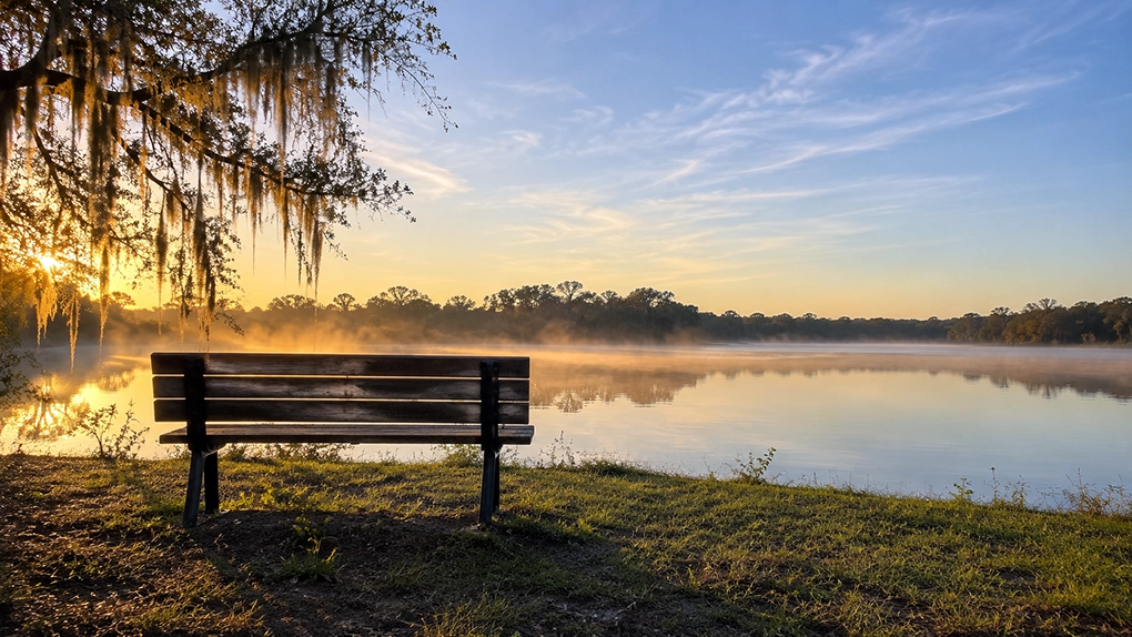 Sunrise on a serene lake.